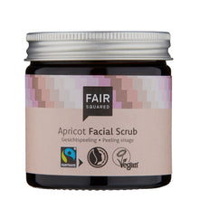 Fair Squared Apricot Facial Scrub is in a brown glass jar with a light pink label and a silver screw top lid on a white background