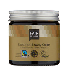 A jar of Fair Squared Extra Rich Beauty Cream with a brown label, silver lid, and black container, shown on a plain white background.