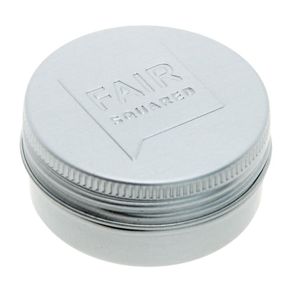 Fair Squared Shea Lip Balm tin sideway on white background