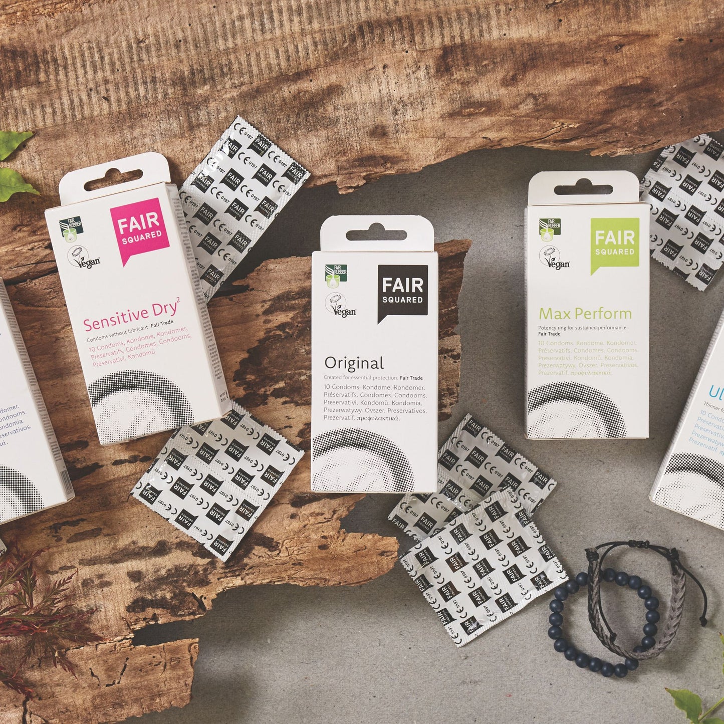 Fair Squared condoms packagings in natural background