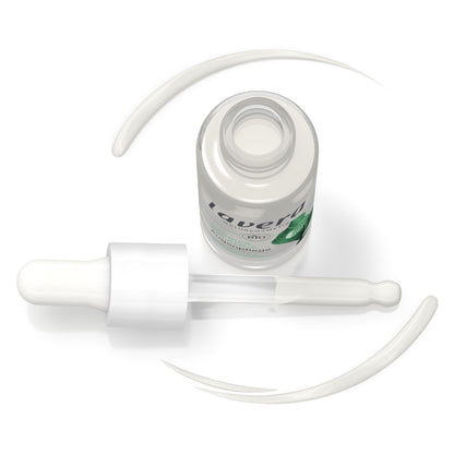 Lavera Barrier balance eye cream in clear glass dropper bottle with a white dropper cap and a white curved line of cream shown around it on a white background. The label has green accents and the brand name appears to read 'lavela'.