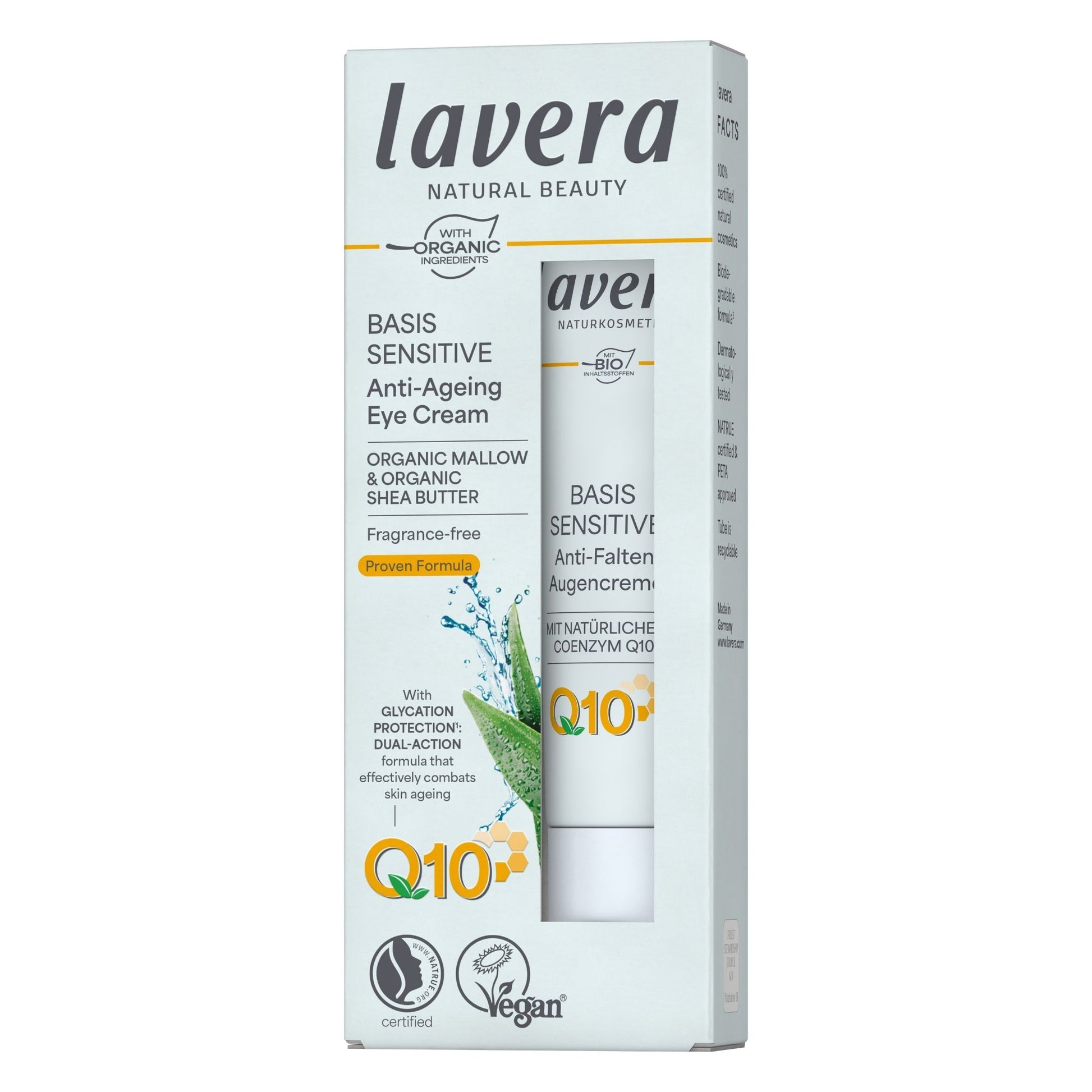 Lavera Natural Beauty Basis Sensitive Anti-Ageing Eye Cream in a white cardboard box, sideway with a clear window showing the white tube inside. The packaging features green and yellow accents, including a graphic of a green aloe leaf and text highlighting organic ingredients and Q10 content.