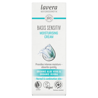 A tall rectangular box of Lavera Basis Sensitiv Moisturising Cream on a plain white background. The packaging is white with teal and dark gray text, featuring a water droplet graphic in the center and various certification logos at the bottom.