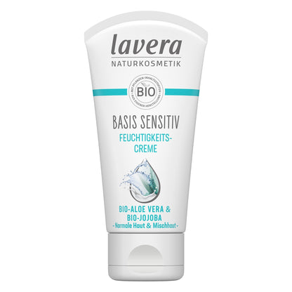 A white squeeze tube of Lavera Basis Sensitive Moisturising Creme with teal and gray text, shown on a plain white background.