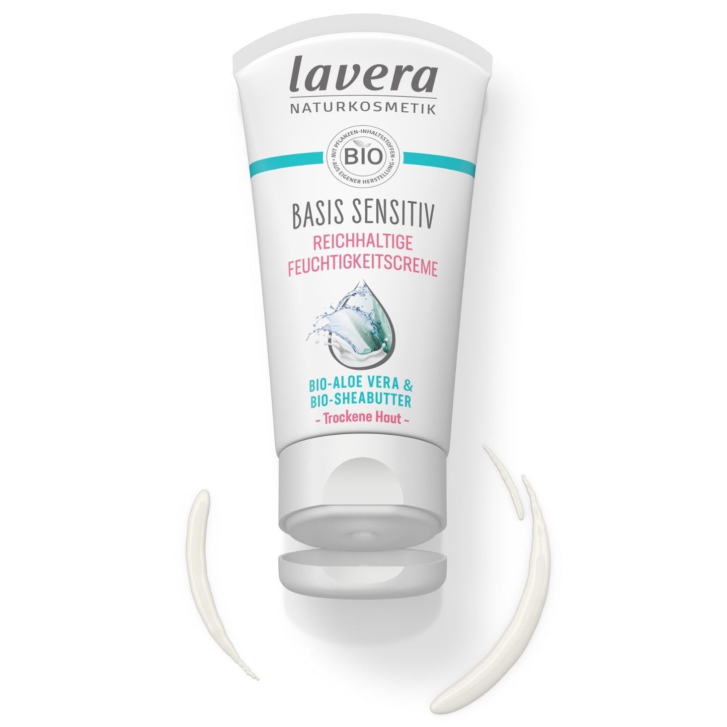 Lavera Basis Sensitive moisturising cream in a white squeeze tube with teal and pink text, shown on a white background with a dollop of the cream below.