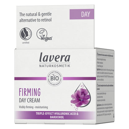 Lavera Firming Day Cream packaging box, featuring a white design with purple accents, a purple flower graphic, and text highlighting bio ingredients and day cream variant.