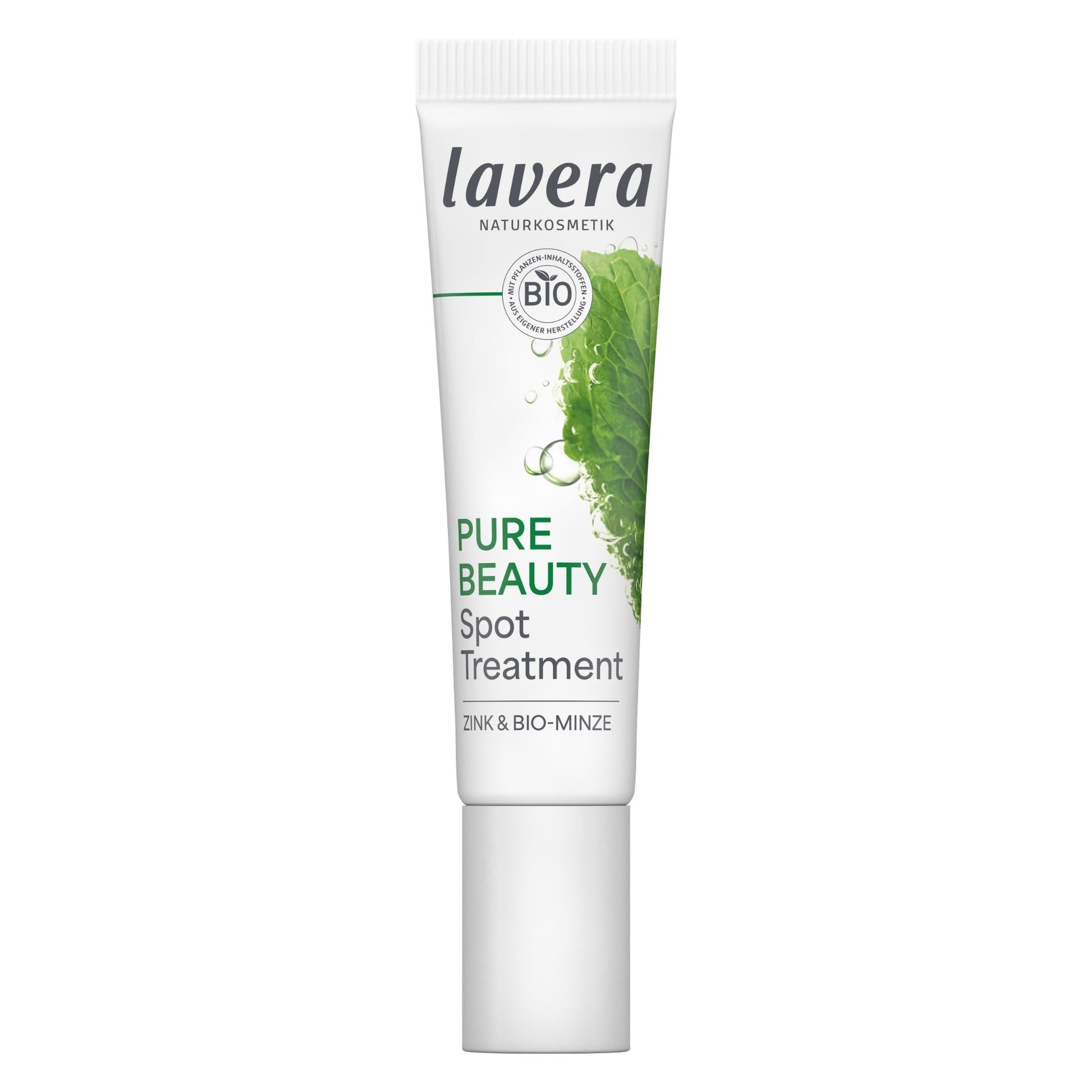A white squeeze tube of Lavera Pure Beauty Spot Treatment with green leaf graphics and text, shown on a plain white background.