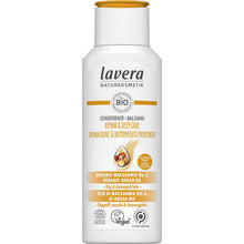 Lavera Repair and Deep Care Conditioner with organic macadamia and organic argan oil  is in a white plastic bottle with a flip top lid.