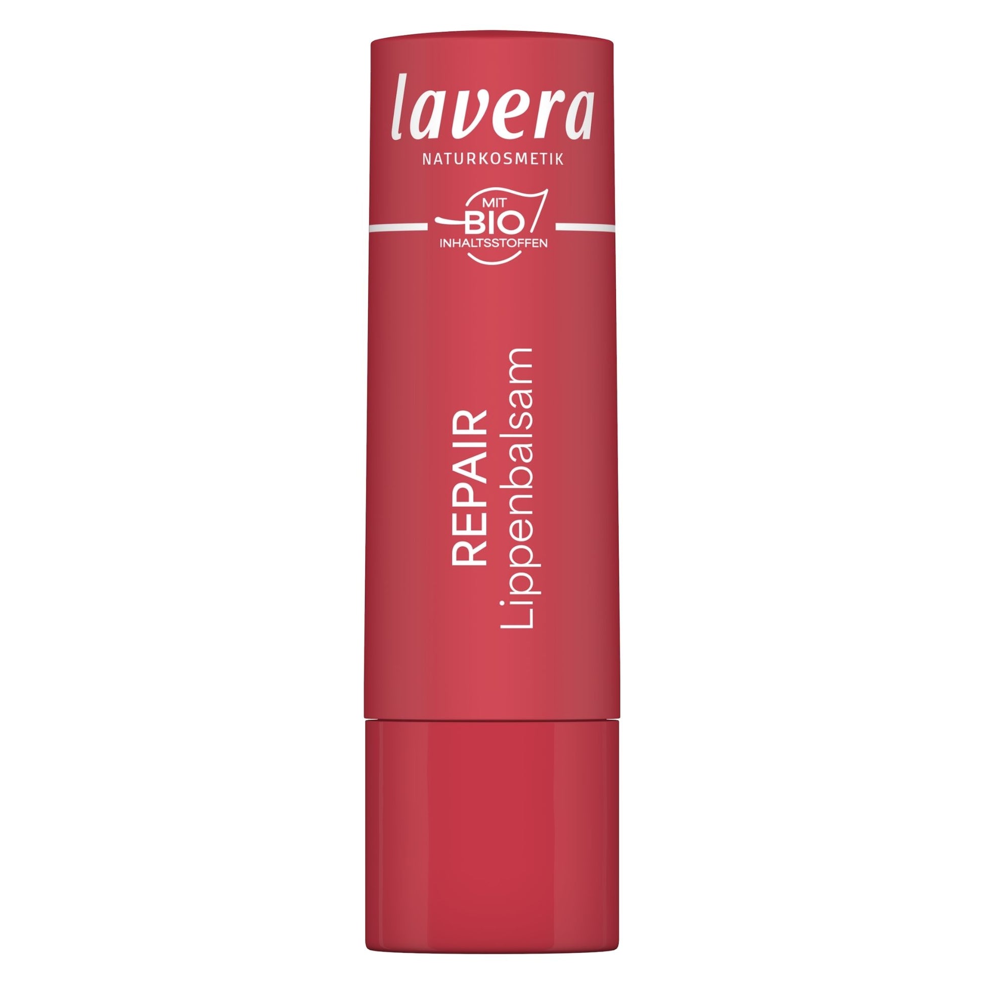 A red tube of Lavera Repair lip balm on a plain white background.