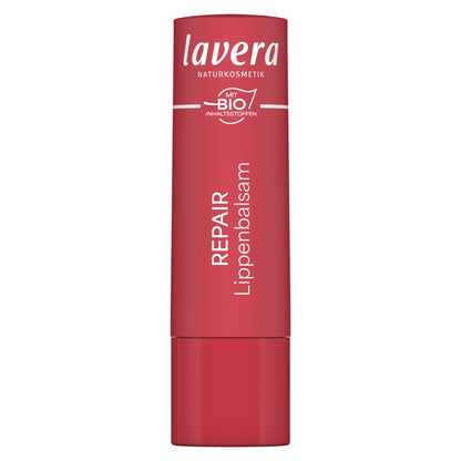 A red tube of Lavera Repair lip balm on a plain white background.