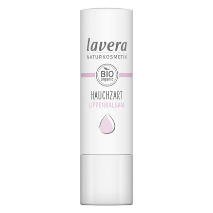 A white cylindrical stick of Lavera Natural Lip Balm with a white cap, featuring pink and gray text and a pink droplet icon on a white background.
