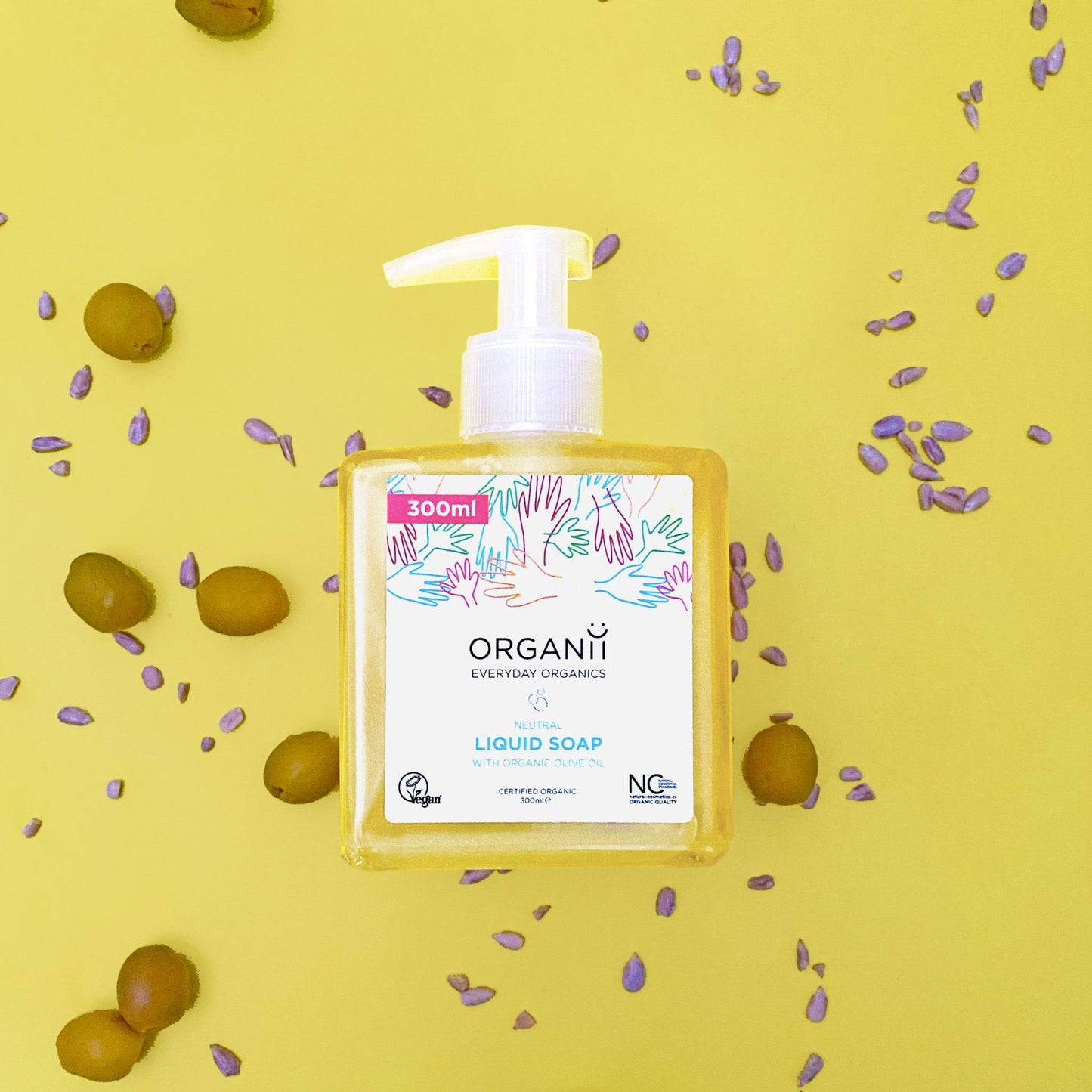Organii Neutral Liquid Soap, Fragrance Free in a square plastic bottle with a pump on yellow background with olives