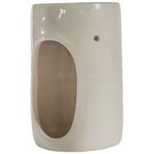 Soil Ceramic Oil Burner is cream coloured  and a gap to put a tea light in. 