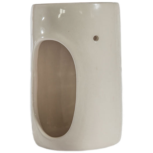 Soil Ceramic Oil Burner is cream coloured  and a gap to put a tea light in. 