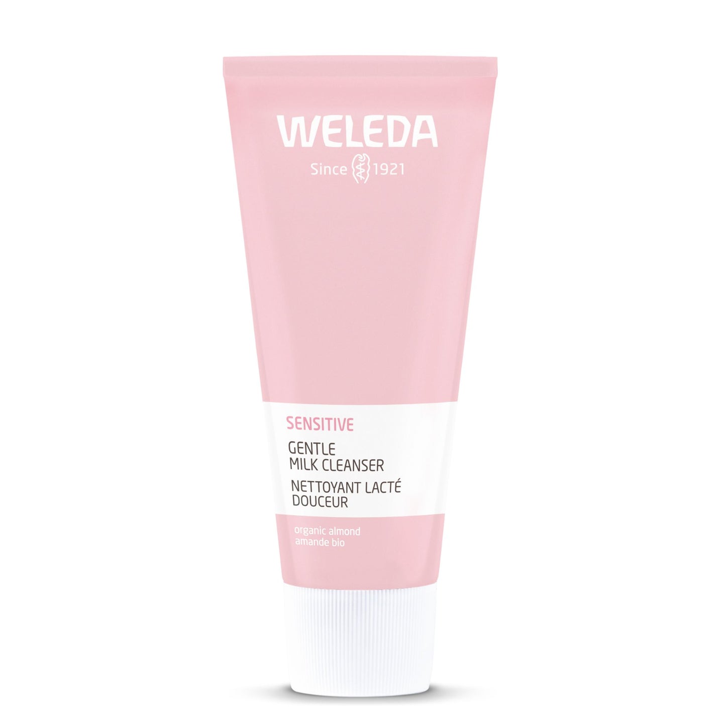 A pink squeeze tube of Weleda Sensitive Gentle Milk Cleanser with a white cap, centered on a plain white background.
