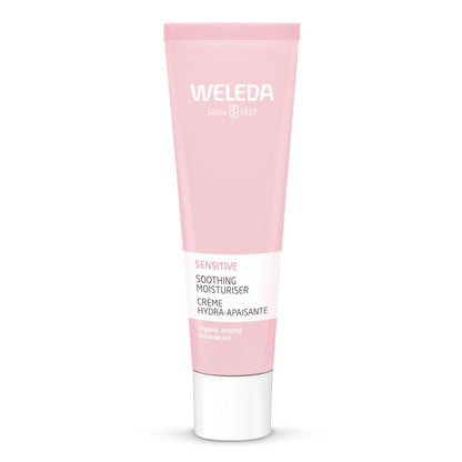 A pink squeeze tube of Weleda Sensitive Soothing Moisturiser with a white cap, centered on a clean white background.