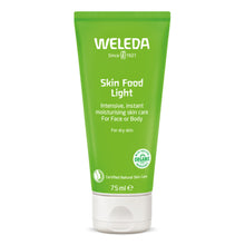A 75ml squeeze tube of Weleda Skin Food Light moisturising cream, featuring a bright green body and a white flip-top cap, set against a plain white background.