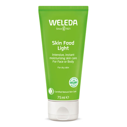 A 75ml squeeze tube of Weleda Skin Food Light moisturising cream, featuring a bright green body and a white flip-top cap, set against a plain white background.